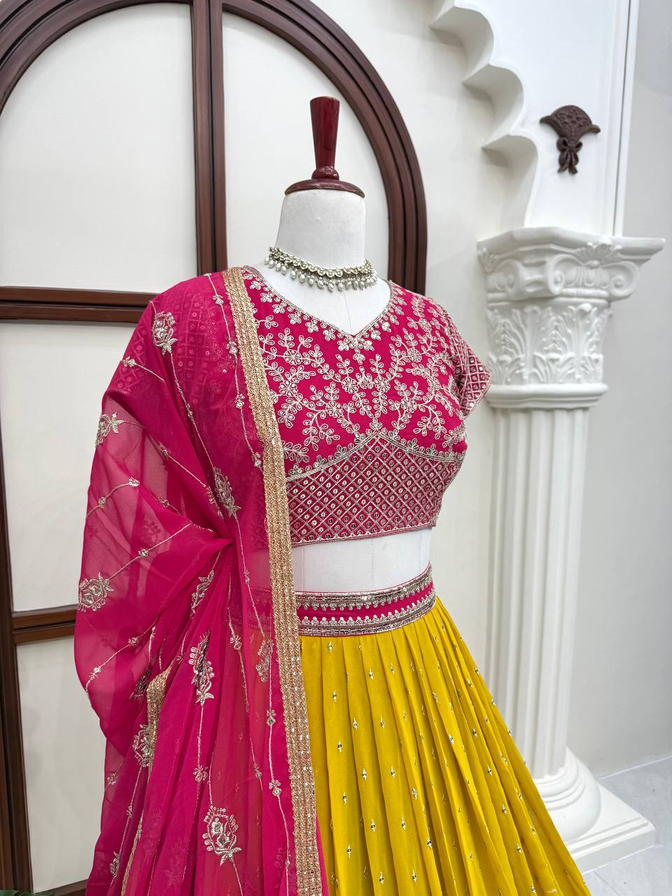Vibrant Sunshine Yellow and Fuchsia Pink Designer Lehenga Choli with Dazzling Shimmer Embellishments